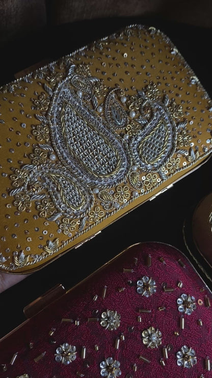GENDA PHOOL CLUTCH
