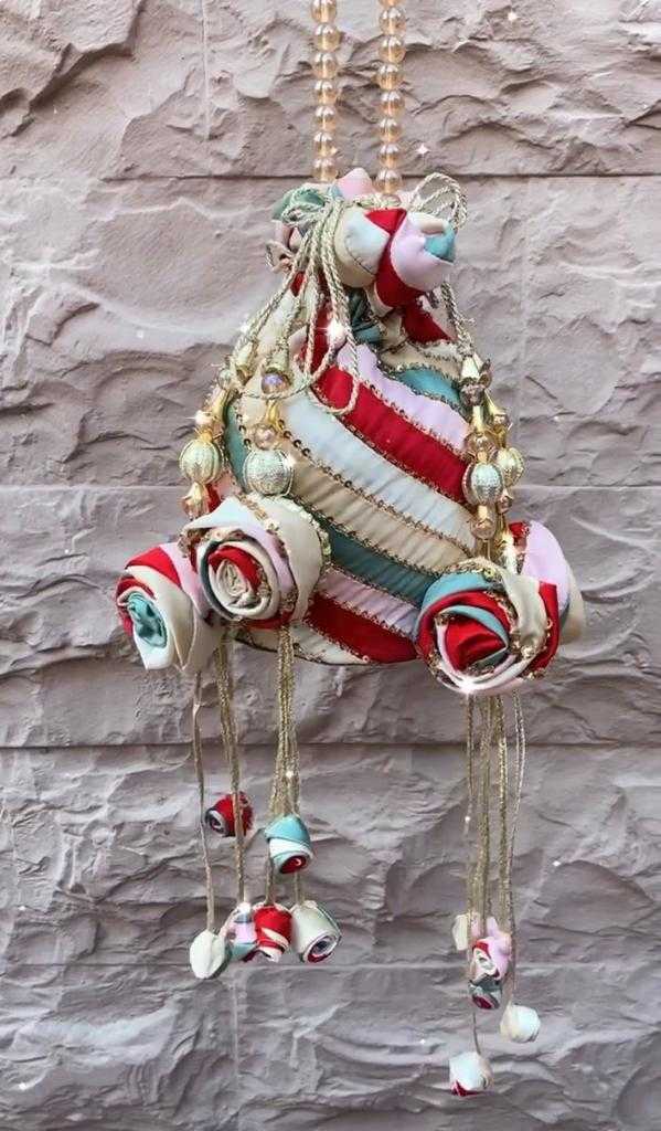 CRIMSON ROSETTES POTLI